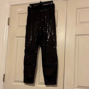 💥💥💥Turn heads in these Eloquii Shimmering Black sequin front/plain back Leggings
